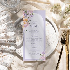 May include: A wedding menu card with a purple and white floral design. The menu includes appetizers, main course, beverages, and desserts. The text at the bottom reads "Jessica & Richard 12.12.20XX".