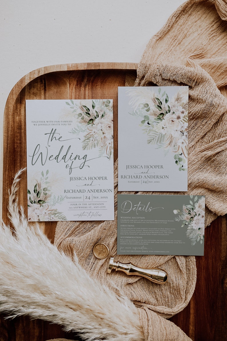 May include: A wedding invitation suite featuring three rectangular cards with floral and pampas grass illustrations. The text includes the names Jessica Hooper and Richard Anderson, wedding details, and a separate details card with a sage green background.