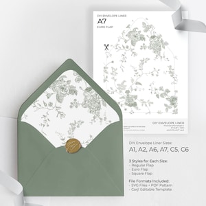May include: An open sage green envelope with a floral liner and a gold wax seal. A white card with a floral design and text "DIY Envelope Liner A7 EURO FLAP" is next to the envelope. A white ribbon is in the background.