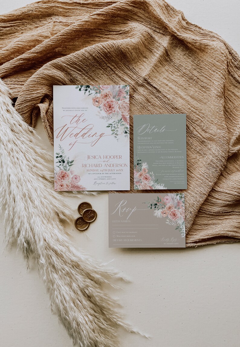 May include: A wedding invitation suite with a floral design. The invitation features a watercolor illustration of pink roses and greenery. The RSVP card has a floral design and the text "RSVP" in cursive. The details card has a floral design and the text "Details" in cursive.