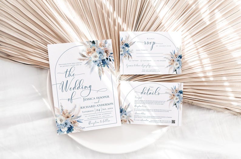 May include: Wedding invitation suite with a blue and white floral design. The invitation features the text "the wedding of Jessica Hooper and Richard Anderson".