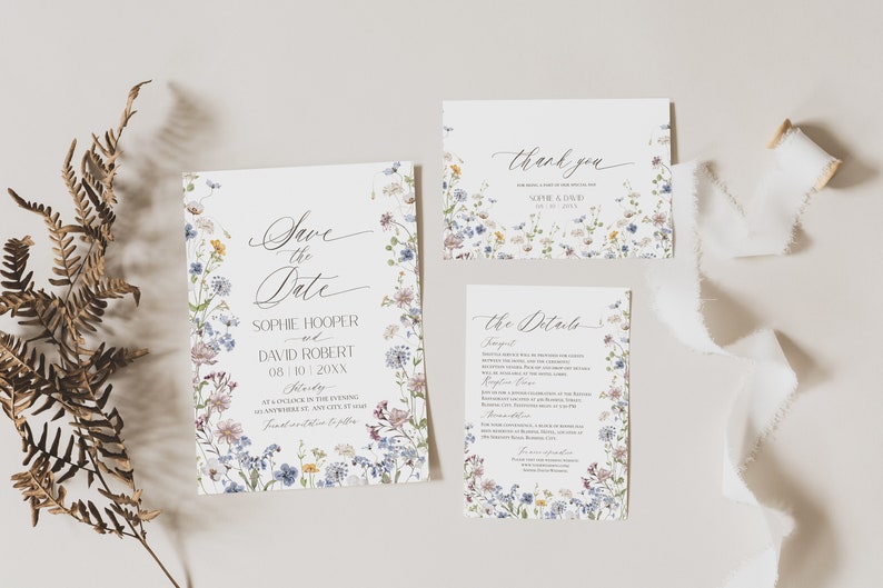 May include: A wedding stationery set featuring a Save the Date card, a thank you card, and a details card, all decorated with a colorful wildflower border. The text includes Save the Date, Sophie Hooper and David Robert, thank you, and the details.