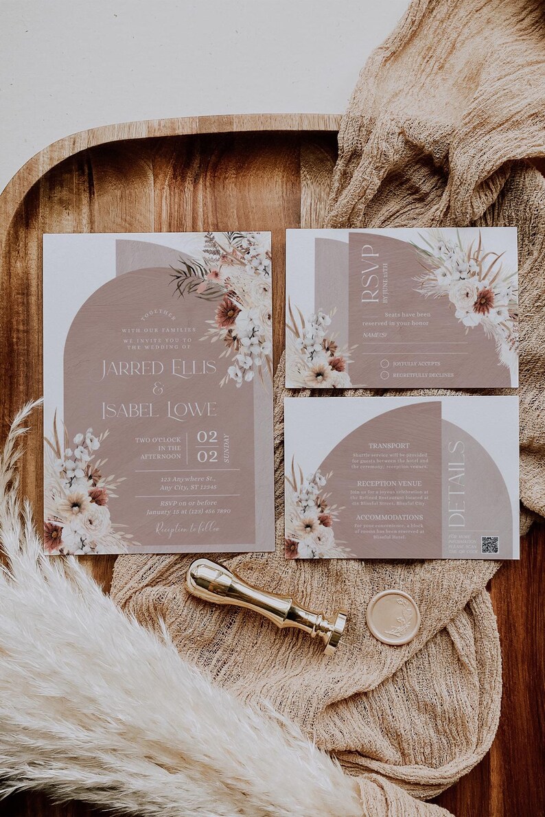 May include: A wedding invitation suite with a brown background and floral illustrations. The invitation includes the names "Jarred Ellis & Isabel Lowe" and the date "02.02.2022". The RSVP card includes a section for guests to indicate their attendance and dietary preferences. The details card includes information about transportation, reception venue, and accommodations.