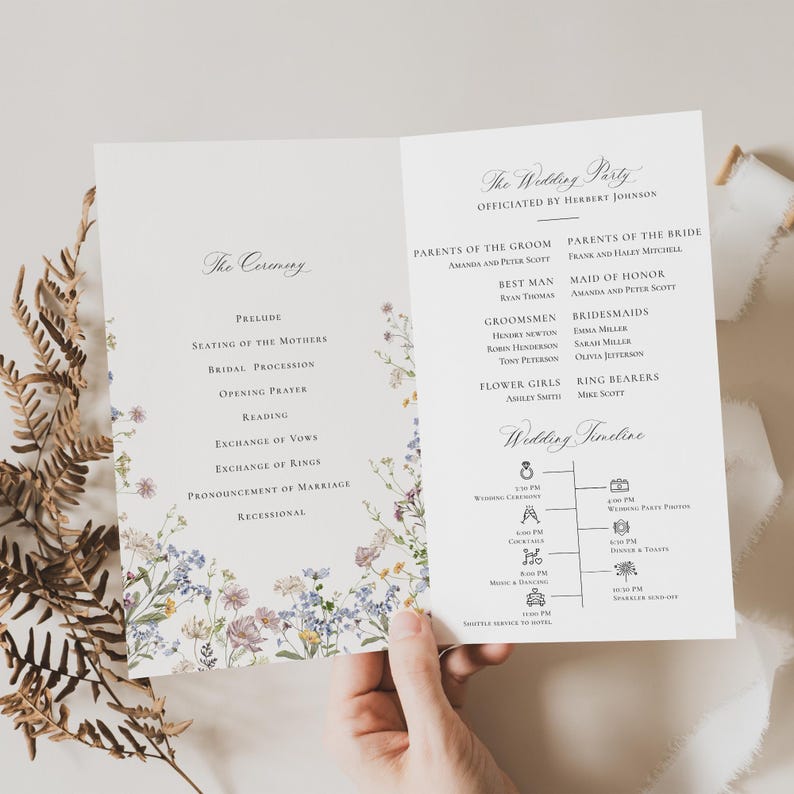 May include: A wedding ceremony program with a floral design. The program includes the order of events, the wedding party, and a timeline of the day. The text includes the names of the bride and groom, the officiant, the wedding party, and the wedding timeline.