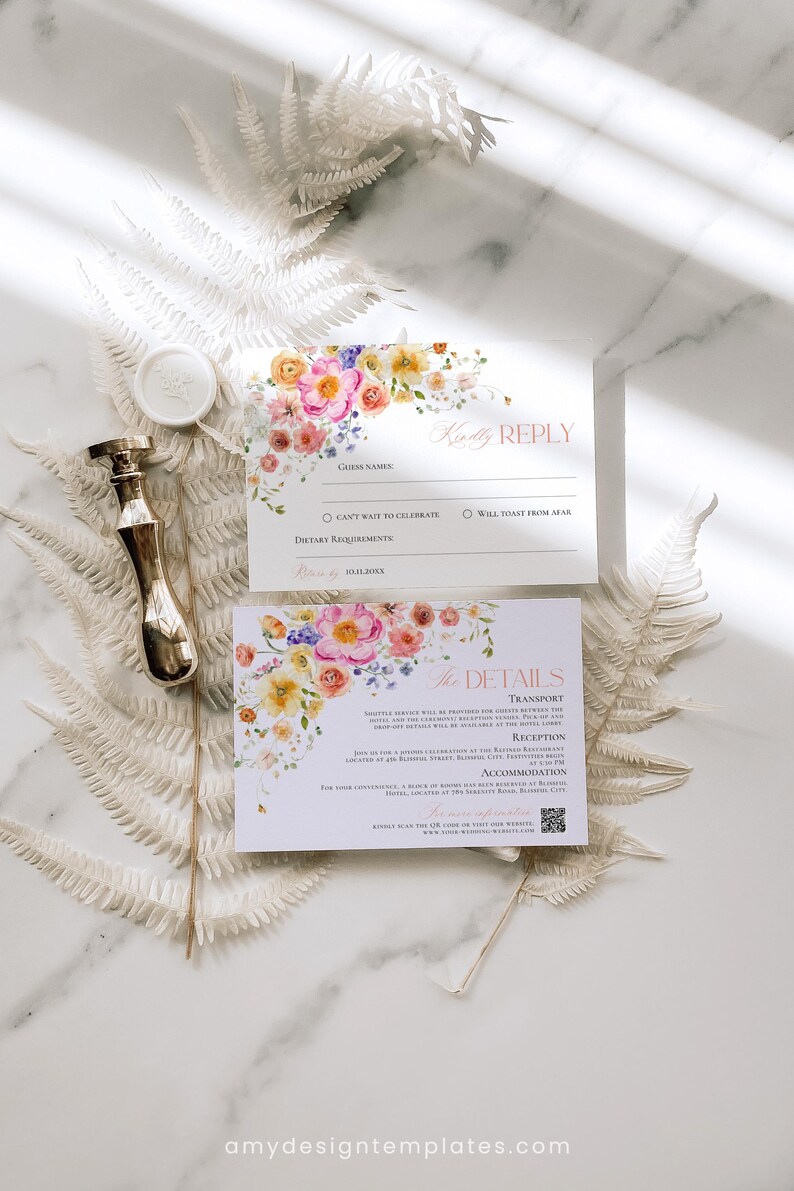 May include: Two white rectangular cards with floral watercolor illustrations in pink, orange, and yellow. The top card reads Kindly REPLY and the bottom card reads The DETAILS, including a QR code and text about transport, reception, and accommodation.