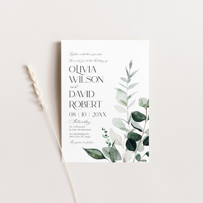 May include: A wedding invitation with a watercolor design of eucalyptus leaves in shades of green and white. The invitation text reads "Together with their families, we invite you to the wedding of Olivia Wilson and David Robert, 08 | 10 | 20XX, Saturday, at 3 o'clock in the afternoon, 123 Anywhere St., Any City, ST 12145, Reception to follow."