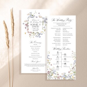 May include: A wedding program with a floral design featuring a wreath of blue and pink flowers. The program includes the wedding ceremony order, the wedding party, and a wedding timeline. The text on the program includes the names Sophie and David, the date 08.07.20XX, and the wedding party members.