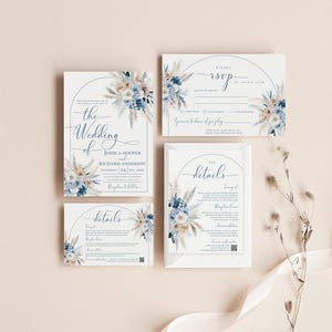 May include: Wedding invitation suite with a blue and white floral design. The invitation features the text "the Wedding of Jessica Hooper and Richard Anderson" with the date "Saturday 24, Sep. 2023". The RSVP card includes the text "Kindly RSVP by August 27th".