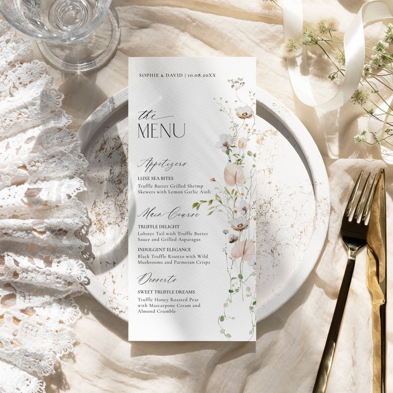May include: A vertical white menu card featuring the text SOPHIE & DAVID | 10.08.20XX, the MENU, Appetizers, Main Course, and Desserts. The card is decorated with a delicate watercolor illustration of wildflowers in soft pink, white, and green tones.