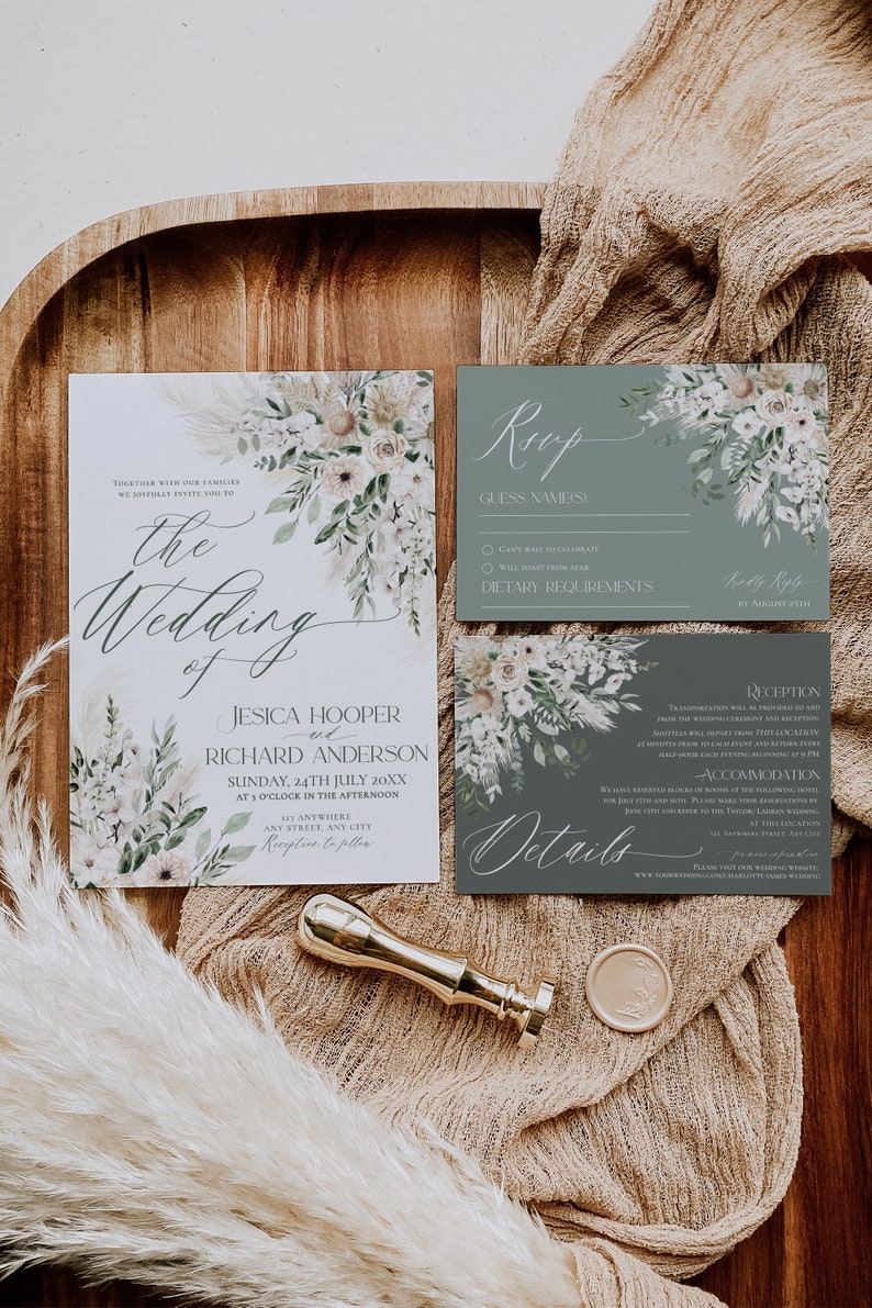 May include: A wedding invitation suite with a floral design. The invitation card is white with a floral border and the text "The Wedding of Jesica Hooper and Richard Anderson, Sunday, 24th July 20XX at 3 o'clock in the afternoon, Anywhere, Any Street, Any City". The RSVP card is gray with a floral border and the text "RSVP, Guess Name(s), Can't wait to celebrate, Will travel from afar, Dietary Requirements". The details card is gray with a floral border and the text "Reception, Transportation will be provided to and from the wedding ceremony and reception. Shuttles will depart from this location every 15 minutes prior to each event and return every half hour after each event, beginning at 3 p.m. Accommodation, We have reserved blocks of rooms at the following hotel for both you and your guests. Please make your reservations by June 1st and refer to the "Anderson/Hooper Wedding" for this special rate. 123 Anywhere Street, Any City, 123-456-7890, Please visit our wedding website for more information: www.yourweddingdomain.com/james-wedding".