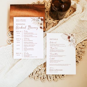 May include: Two white wedding stationery cards featuring brown text and floral illustrations. The left card is a weekend itinerary for Jessica and Richard, and the right card lists event details, transportation, and contact information for the couple.