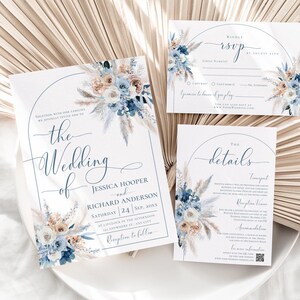 May include: Wedding invitation suite with a blue and white floral design. The invitation features the text "the wedding of Jessica Hooper and Richard Anderson". The RSVP card includes a section for guests to indicate their attendance and meal preference. The details card provides information about the ceremony and reception.