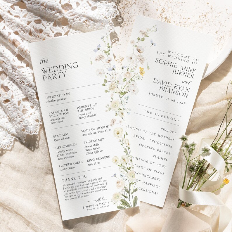 May include: Elegant wedding programs with floral accents. The programs feature the text "The Wedding Party" and "Welcome to the Wedding of Sophie Anne Jurner and David Ryan Branson". The design includes delicate flowers.