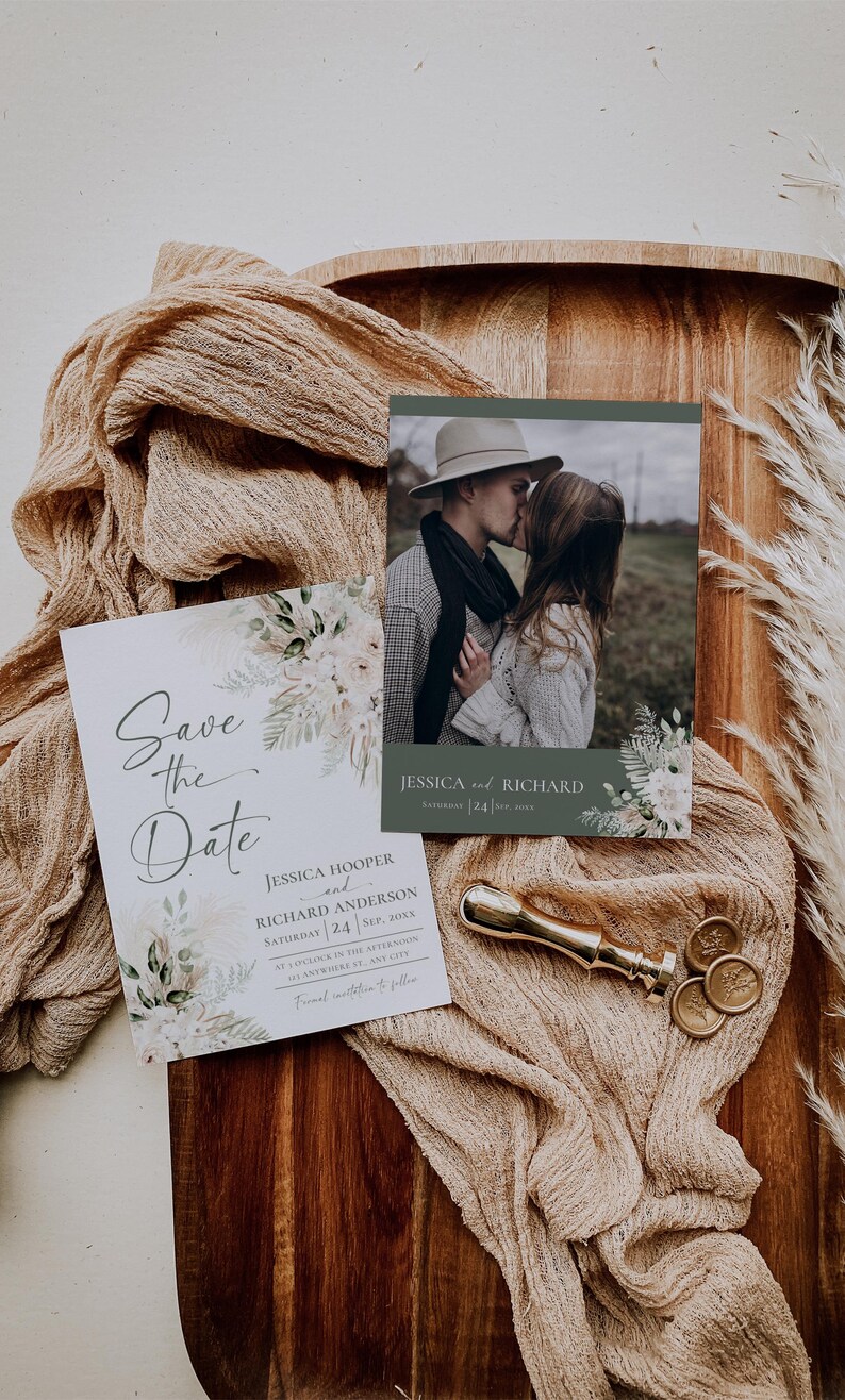 May include: Save the date wedding invitation with a floral design and a photo of a couple kissing. The invitation includes the names Jessica Hooper and Richard Anderson, the date September 24, 20XX, and the time at 1 o'clock in the afternoon. The invitation also includes the text "Save the Date" in a cursive font.