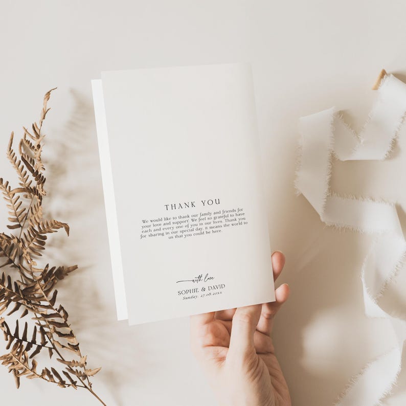 May include: A white folded thank you card featuring black printed text that reads: THANK YOU, We would like to thank our family and friends for your love and support. We feel so grateful to have each and every one of you in our lives. Thank you for sharing in our special day, it means the world to us that you could be here. with love, SOPHIE & DAVID, Sunday, 27.08.2023.