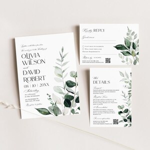 May include: A wedding invitation suite with a white background and green watercolor floral illustrations. The invitation card features the couple's names, wedding date, and time. The RSVP card includes a QR code and space for guests to provide their details. The details card lists the wedding transportation, reception venue, and accommodation information.