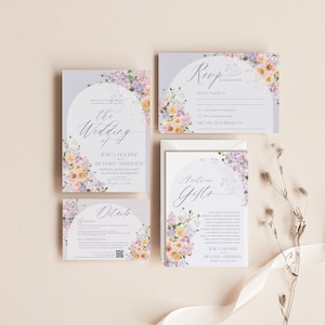May include: Purple and yellow floral wedding invitation suite with a semi-circle design. The invitation includes the text "The Wedding of Jessica Hooper and Richard Anderson" and the date "Sunday, 14th July 20XX". The RSVP card includes the text "RSVP by August 25th" and "Dietary Requirements". The details card includes the text "Reception" and "Accommodation". The gifts card includes the text "Antem Gifts" and "Jessica Hooper and Richard Anderson".