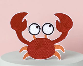 Grappige rode krab strijkpatch, embleem van een zeedier, verkrijgbaar in 2 maten (6,5 of 7,5 cm) om je outfit te personaliseren.