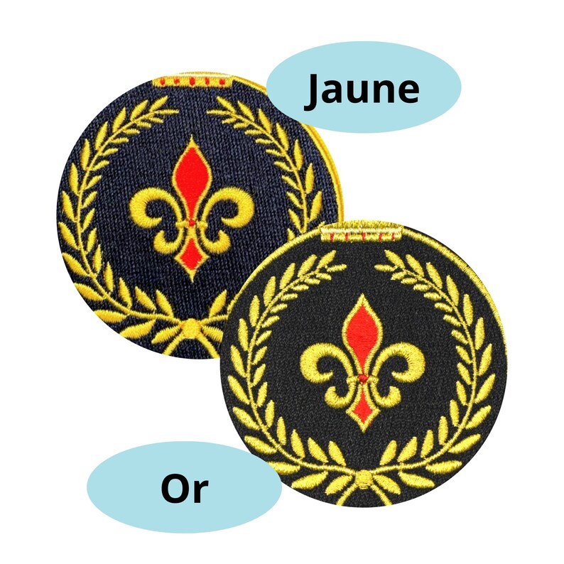 May include: Two round black fabric patches with gold embroidered laurel wreaths and a red fleur-de-lis in the center. The text "Jaune" and "Or" are written in blue on white ovals.