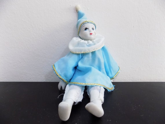 antique porcelain clown dolls