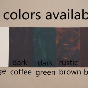 May include: Five color swatches of fabric. The colors are beige, dark coffee, dark green, rustic brown, and red brown.