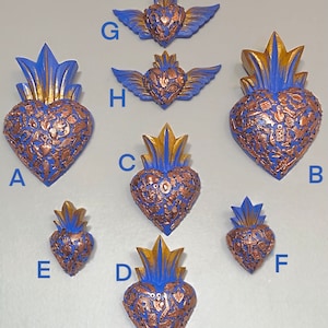 Corazón de madera Milagros (azul pacífico) / Corazón moderno Milagro / Corazón con dijes Milagros / Corazón alado / Sagrado corazón