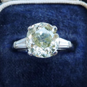 Stunning art deco platinum 3.95ct diamond solitaire engagement old and baguette cut vintage antique ring