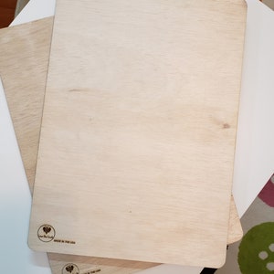 May include: Two wooden cutting boards with a heart logo and the text "Love the Earth" and "Made in the USA".