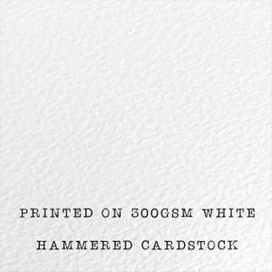 The image is a printed white paper with the text "HANDMED CARDSTOCK" printed on it.