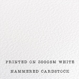 The image is a printed white paper with the text "HANDMED CARDSTOCK" printed on it.