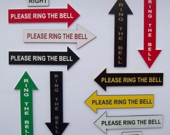May include: Nine different signs with arrows pointing in various directions. The signs are black, white, red, green, and yellow with black text that reads "Please Ring The Bell" and "Ring The Bell". The signs are labelled "Right" and "Left".