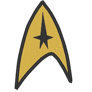 Könnte beinhalten: Ein gelbes gesticktes Starfleet-Abzeichen mit schwarzem Rand und einem schwarzen fünfzackigen Stern in der Mitte.