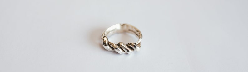 Men's Silver Knotted Ring image 1