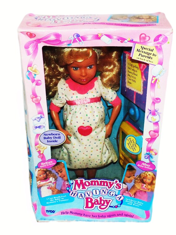 mommys having a baby doll