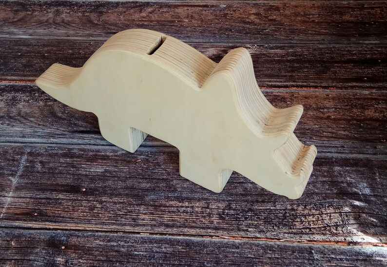 wooden dinosaur piggy bank