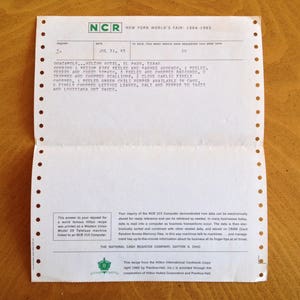 May include: A white paper receipt with black text from the National Cash Register Company, dated July 31, 1965. The receipt is for a recipe from the Hilton Hotel in El Paso, Texas. The recipe is for a "Shacamolé" dish and includes a list of ingredients.