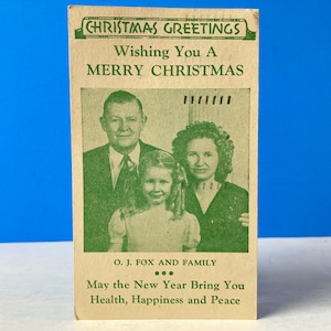 Carte postale de photo de famille de salutations de Noël