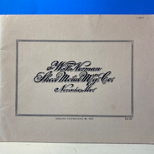 May include: A beige cover for a catalogue for the W.F. Norman Sheet Metal Mfg. Co. in Nevada, MO. The cover has a black border and the company name in a stylized font. The text "Ceiling Catalogue No. 350" and "$3.00" are printed in black at the bottom of the cover.