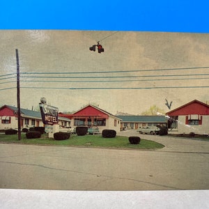 Skylit Motel Postcard