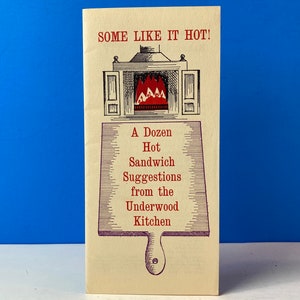 May include: A vintage pamphlet with a red and black illustration of a fireplace and the text "SOME LIKE IT HOT!"  A Dozen Hot Sandwich Suggestions from the Underwood Kitchen.