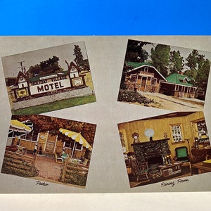 Carte postale de motel de village de vacances