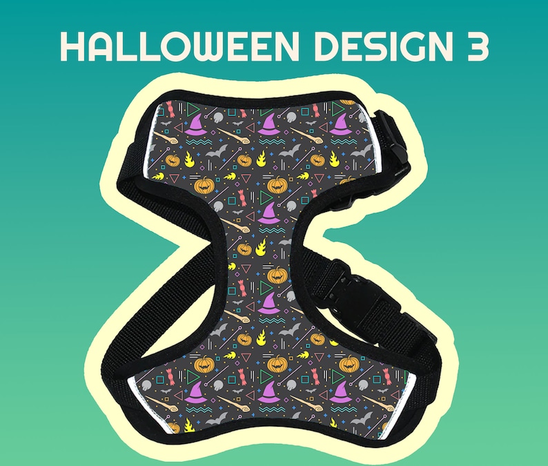 May include: Black adjustable dog harness with a Halloween themed pattern. The pattern features pumpkins, witches hats, bats, and other Halloween symbols in bright colors on a dark gray background.