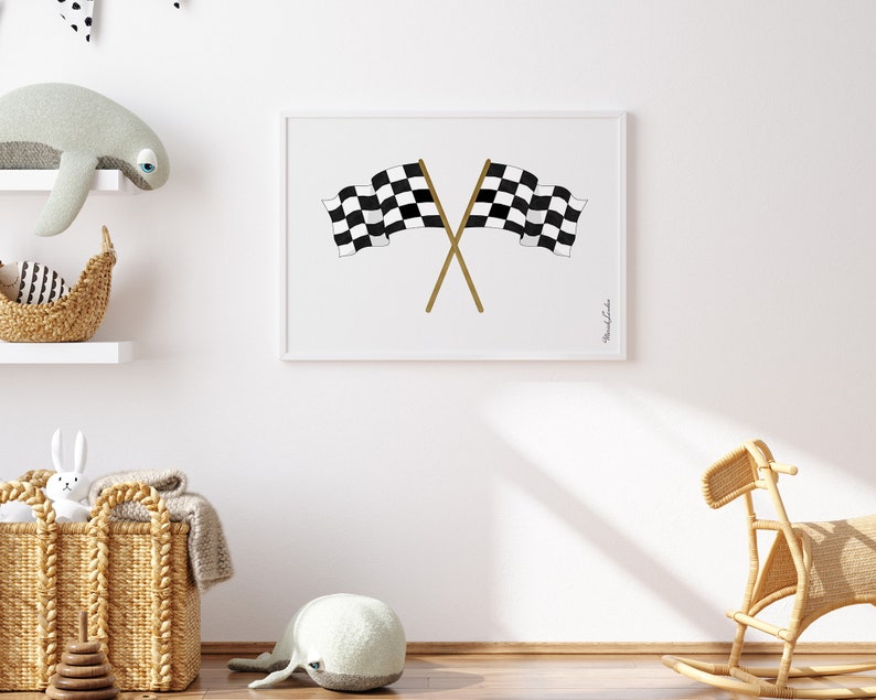May include: A black and white checkered racing flag print with gold crossed sticks in a white frame. The print is hanging on a white wall.