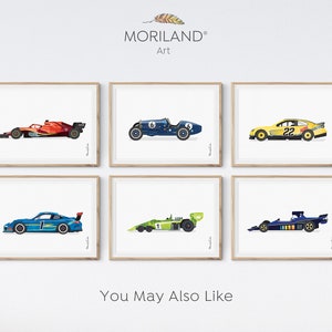 May include: Six framed prints of different race cars, including a red Formula One car, a blue vintage race car, a yellow car with the number 22, a blue Porsche, a green and black Formula One car, and a blue and black Formula One car. The prints are arranged in a grid of three rows and two columns. The text "You May Also Like" is printed below the grid of prints.