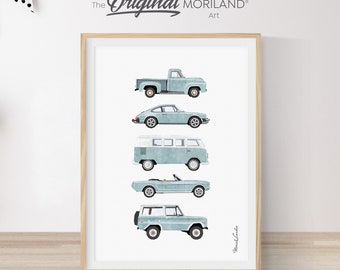 May include: A framed print of five vintage cars in various shades of blue, including a pickup truck, a sports car, a van, a convertible, and a jeep. The print is titled "The Original Moriland Art".
