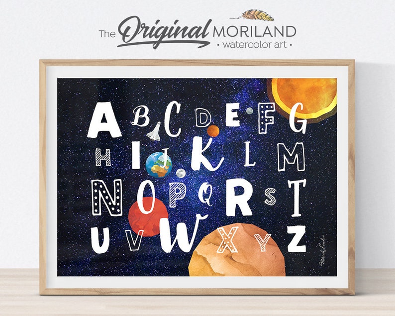 May include: A colorful alphabet poster with a space theme. The letters are white with black outlines and are surrounded by planets, stars, and a rocket ship. The background is a dark blue with white stars.