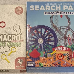 May include: Two board games, one with a white background and the text "Micro Macro Crime City Full House" and the other with a colourful background and the text "Search Party Chaos at the Park".