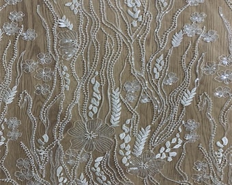 Tela de encaje con cuentas de lentejuelas blancas, vestido de novia de encaje de alta costura, aplique de flores de tul con bordado de hojas florales estilo bohemio cortado a medida