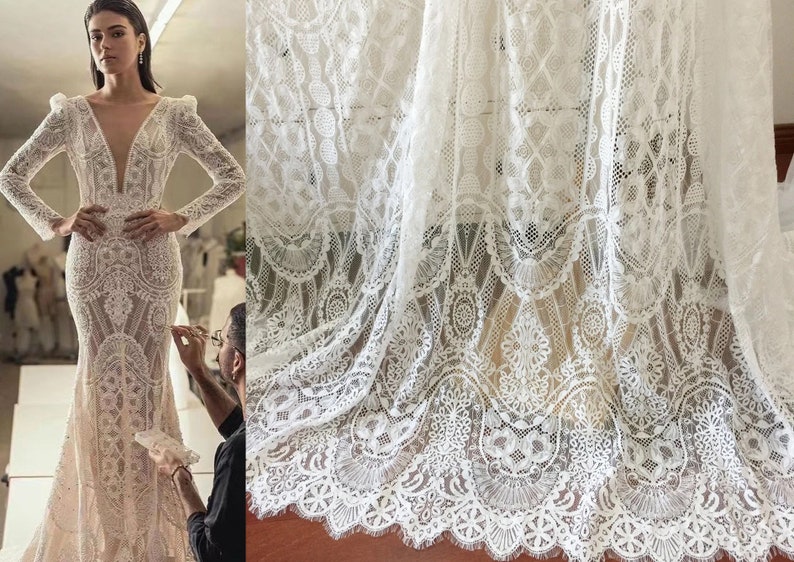 May include: White lace fabric with a delicate floral pattern. The lace has a scalloped edge and is perfect for crafting, sewing, or decorating.