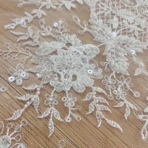 thumbnail image 2 of White Beaded Floral Lace Fabric By The Yard – Embroidered Sequin Lace – Divas Textiles (Width 46-59", 36"x52" Square) 2 of 6